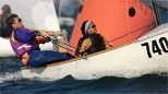 Mike Kalin and Ariya Dararutana sail the "Susan B" during the Interclub Dinghy Frostbite Nationals on Duxbury Bay.
