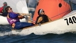 Mike Kalin and Ariya Dararutana sail the "Susan B" during the Interclub Dinghy Frostbite Nationals on Duxbury Bay.