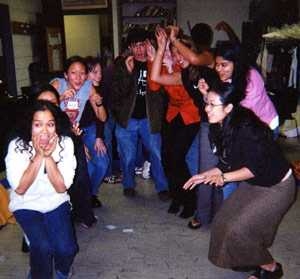 The cast, directors and producers engage in a workshop activity during early rehearsals for "The Vagina Monologues."