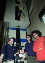 Professor Yoel Fink, far left, graduate student Shandon Hart, center, and post-doc  Burak Temelkuran worked on the project