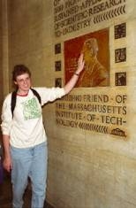 Senior Amanda Bligh rubs the nose on the George Eastman plaque.