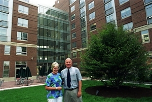 Housemasters moving into their new homes on campus include Roger and Dotty Marks in the courtyard of 70 Pacific St John and Ellen            Essigmann (below) in Simmons Hall.