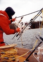 David Senn with the filtration unit he and Professor Harry Hemond built to take water samples from the depths of the Upper Mystic Lake.