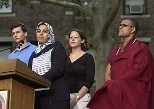 Representing their faiths at the podium are (left to right) Andrew Goldsweig, a Jewish senior in chemistry; Sarah Saleh, a Muslim graduate student in aeronautics and astronautics; Maureen Long, a graduate student in earth, atmospheric and planetary sciences, representing Christian traditions; and Buddhist Priyadarshi Shukla of the Harvard Divinity School.