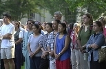 Members of the MIT community listen to President Vest's remarks during Wednesday's flag-lowering ceremony.