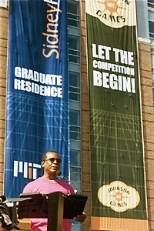 Dean of Graduate Students Isaac Colbert offers remarks at the dedication of the "magnificant new Sidney-Pacific dormitory."