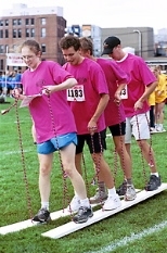 Members of the New-Tang Clan team participate in the "Slide Rules" event. Front to back: Kate Ryan, Chris Brooks, Chris Rycroft, Scott Litzelman.