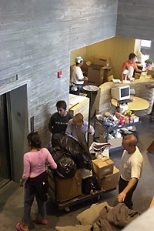 The first residents of Simmons Hall move in with boxes of belongings in late August.