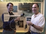 Ocean engineering graduate student Joshua Wilson, left, and Professor Nick Makris  display a hydrophone that can be used to record sound associated with high winds.