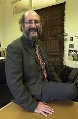 Lawrence Vale, the new head of the Department of Urban Studies and Planning, relaxes in his office.
