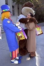 Tracy Daniels gets a hug from Tim the MIT mascot.