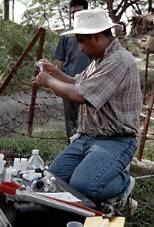 MIT graduate student Khandaker Nurul Ashfaque tests water chemistry in Bangladesh.