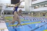 Al and Barrie Zesiger leap into the pool early on the morning of the dedication ceremonies for the Zesiger Sports and Fitness Center last September