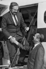 M. Curt Young right, president of Atlantic City Airlines, greets MIT Professor Eugene Larrabee. Undated file photo, MIT Museum