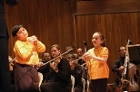 Julian Zamudio, 9, of Westwood and Piper Rollins, 6, of Roslindale play Music Shapers in Toy Symphony's Boston premiere at Kresge Auditorium Saturday night.