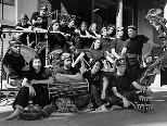 Members of Gamelan Galak Tika pose for a group photo.