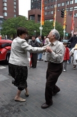 Susan Lester, associate secretary of the Corporation, and Professor Shaoul (Ziggy) Ezekiel dance to the strains of Jay Keyser's New Liberty Jazz Band at the site of the F & T.