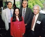 Cambridge First Day award winners are (from left) Michael Charney, Jane Smillie of CitySprouts, Inc., Stephen Oakley of ZipCar, Inc., and Henry Vandermark.