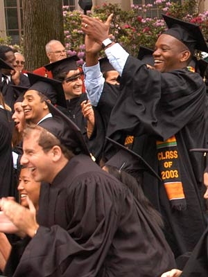 Members of the Class of 2003 cheer on one of their classmates during Commencement at MIT. <a onclick="MM_openBrWindow('01-comm-applause-enlarged.html','','width=509, height=583')">
<span onmouseover="this.className='cursorChange';">Open image gallery</span>
</a>
<noscript> <a href="01-comm-applause-enlarged.html">
<em>(no JavaScript)</em>
</a>
</noscript>