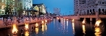 The "WaterFire" installation in downtown Providence, R.I., uses 100 bonfires in braziers set up on three rivers.