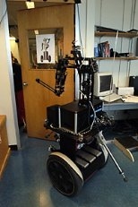 CSAIL's latest robot, Cardea, opens the door to go for a "stroll" in the lab.