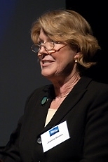 Benton's widow, Jeanne Benton, speaks to an international gathering of scientists and Benton's friends and former students at a symposium to honor his life and work. The event, which had been planned for several weeks, took place at MIT on Nov. 11, two days after Benton's death.