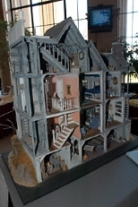 The Women's League is raffling off this dollhouse, built by former set designer Ronald L. Dion, to raise money for Cambridge Cares About AIDS.