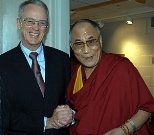 Vest shakes hands with the Dalai Lama, who visited MIT in September.