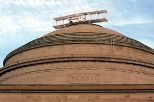 A replica of the Wright brother's biplane "Flyer" was erected on top of the Great Dome at MIT by student hackers, in honor of the 100th anniversary of human, powered flight.