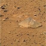 The camera on the Mars rover Spirit recorded this image of a football-size rock, officially named "Adirondack" by MIT Professor John Grotzinger. It was chosen as the rover's first target because its flat, dust-free surface is ideally suited for grinding.