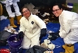 Kelly Johnson, a junior in civil and environmental engineering (left), and freshman Lindsey Sheehan sort through trash on the green near Kresge Auditorium during one of the waste audit sessions in October.