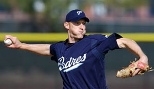 San  Diego Padres pitcher Jason Szuminski throws in a spring training  game.