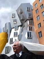 Architect Frank Gehry (above) in front of his latest design--MIT's Stata Center, named for alumnus Ray Stata and his wife Maria Stata.