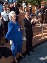 Cathy Dertouzos, widow of Michael Dertouzos, former director of the Lab for Computer Science, and Victor Zue, co-director of CSAIL, let out a yell to the heavens, as they said Michael would have done.