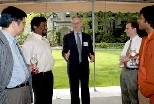 Faculty gathered at Gray House last week to celebrate faculty members who received promotions in 2003-04. Left to right: Gang Chen of mechanical engineering, who was promoted to full professor; Saman Amarasinghe of electrical engineering and computer science (EECS), promoted to associate professor with tenure; President Charles M. Vest; and David Perreault of EECS, and Arindam Dutta of architectur...