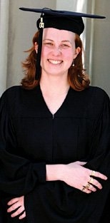 Elizabeth Powers Boyle sports her family���������������������������s four brass rats on her right hand.