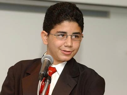 Zawris PeÃ±a, 13, gives a speech to fellow participants in the MIT STEM summer progam.