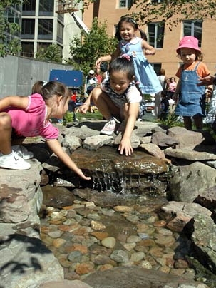 The waterfall made a big splash with youngsters at the grand opening of the newest Technology Children's Center at MIT.