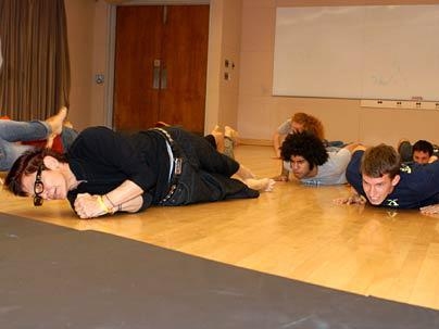 Elizabeth Streb, left, demonstrates extreme movement to students while visiting MIT as an artist in residence and Abramovitz lecturer.