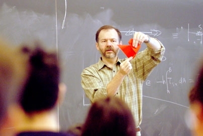 Origami master Robert Lang, artist in residence at MIT from Nov. 11-16, demonstrates how to fold a duck from a square piece of paper.