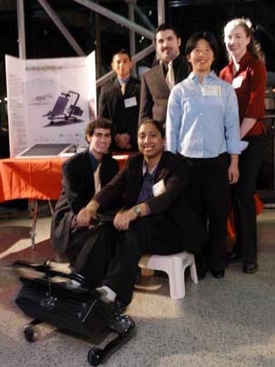 Smitha Raghunathan operates the Kinkajuice human-powered battery charger designed and built by her and her teammates, including (left to right) Etan Trangle, Jim Lin, Alfredo Bocanegra, Jennifer Hu and Lisa Chandler.