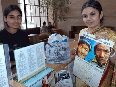 Aparna Jonnalagadda (left), a senior in mechanical engineering, and her mother, Vidya Jonnalagadda, a postdoctoral associate in biological engineering, sell calendars made by students in India. Together they collected donations for tsunami relief in Lobby 10.