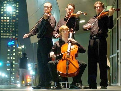 The Calder Quartet, shown posing on a Los Angeles sidewalk, will perform at MIT on Feb. 25.