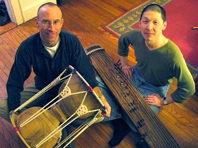 Percussionist Curt Newton (left) and cellist Jeff Song use the chang-go and kayagum, traditional Korean instruments, to create 'music inspired by and drawing upon a huge range of influences.' They will perform on campus on Friday, March 18.