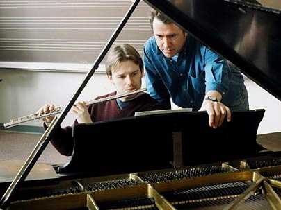 Flutist Ole Nielsen works with composer Graham Ramsay on Ramsay's new piece, 'Four Autumn Sketches,' which will premiere Friday, March 18, in Killian Hall. Nielsen has been a member of the Experimental Study Group since he was a freshman. Ramsay is an ESG administrator and teacher.