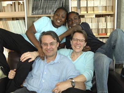 Sally Haslanger, professor of linguistics and philosophy, shares a warm moment with her family--husband Steve Yablo and their two children, Zina, left, and Isaac, both of whom are adopted. Haslanger recently co-edited 'Adoption Matters,' a book about adoption.