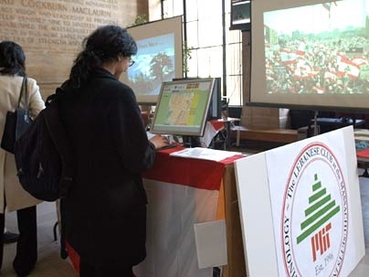 Passers-by explore exhibits on Lebanon in Lobby 10 last week. The Lebanese Club of MIT shared books, video footage and food on April 13-14 as part of Lebanese Awareness Week, which coincided this year with the 30th anniversary of the start of the Lebanese War.