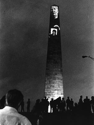 Known for such provocative works as this 1998 video projection onto Bunker Hill Monument, Professor Krzysztof Wodiczko will be on the panel of Wednesday's 'Art and Technology' symposium.
