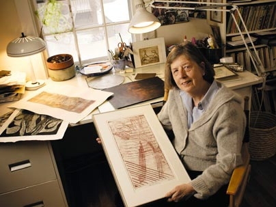 At MIT, Erika Hartwieg prepares images of roundworms for biology Professor H. Robert Horvitz. Outside the lab, Hartwieg applies her artistry to etchings and pottery.