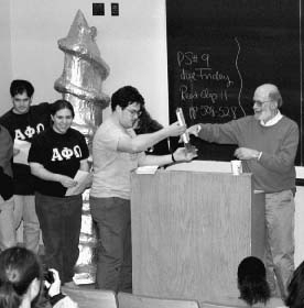 C. Michael Mohr, a senior lecturer in the chemicial engineering department for more than 30 years, receives the Big Screw faculty award in 1998.